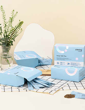 Packaging of Lifening skincare products on a table with a neutral background