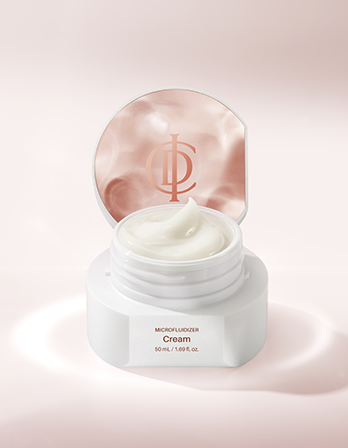 Cream jar with a pink lid on a light pink background