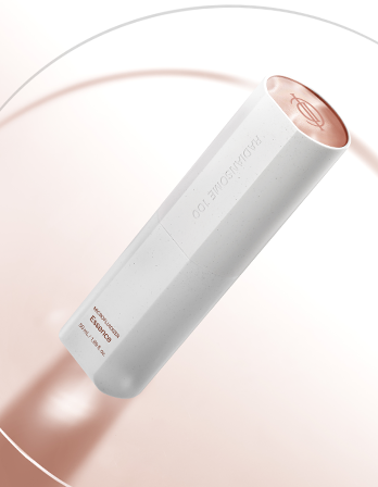 White cylindrical product with rose gold cap on a light pink background