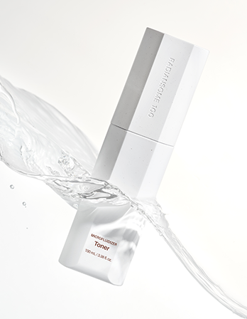 Skincare product with dropper and packaging on a white background