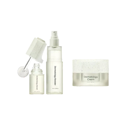 Minimalist Korean skincare set featuring Dermatology Serum, Booster, and Cream in frosted glass packaging with white speckled caps.